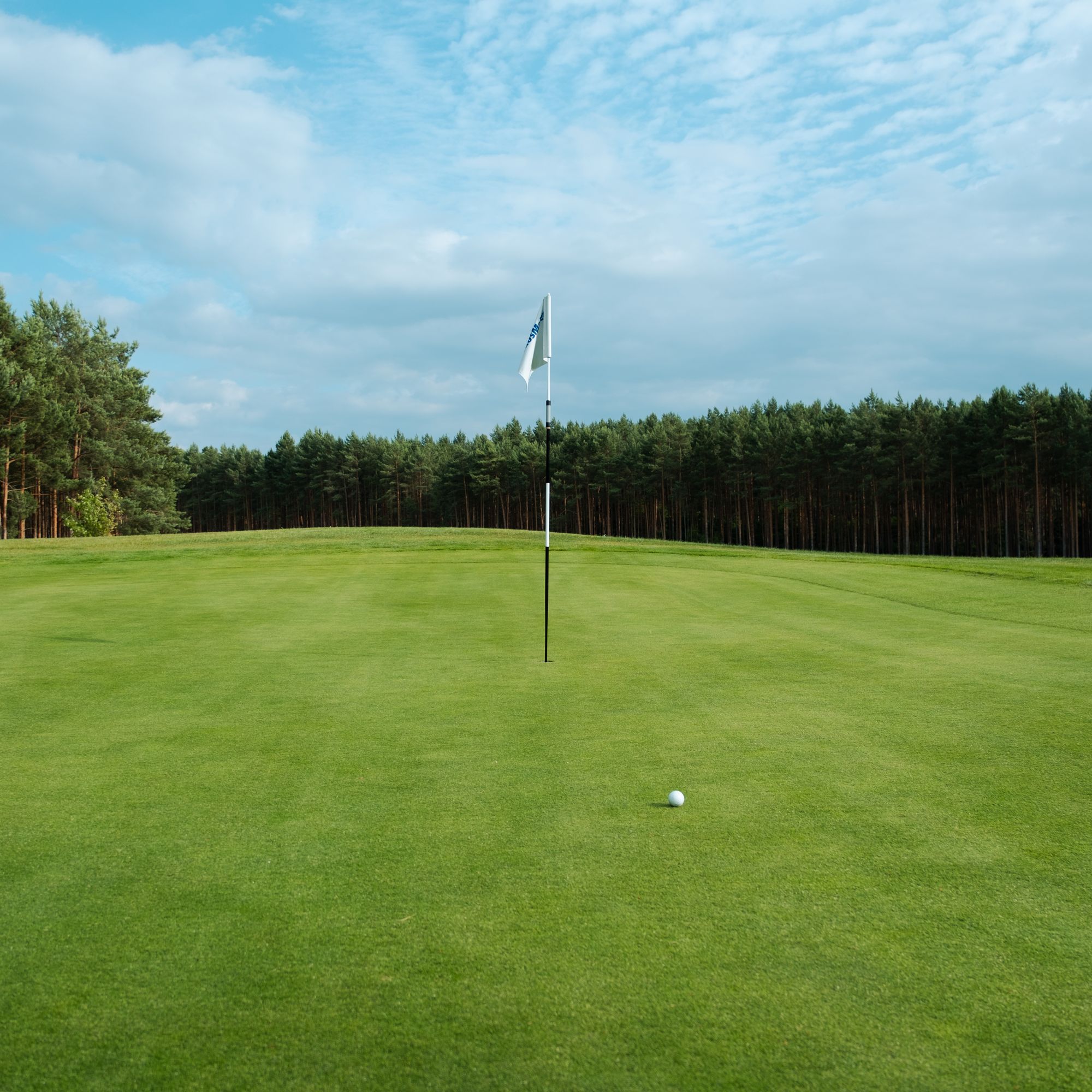 Bespoke coastal golf green at golden hour
