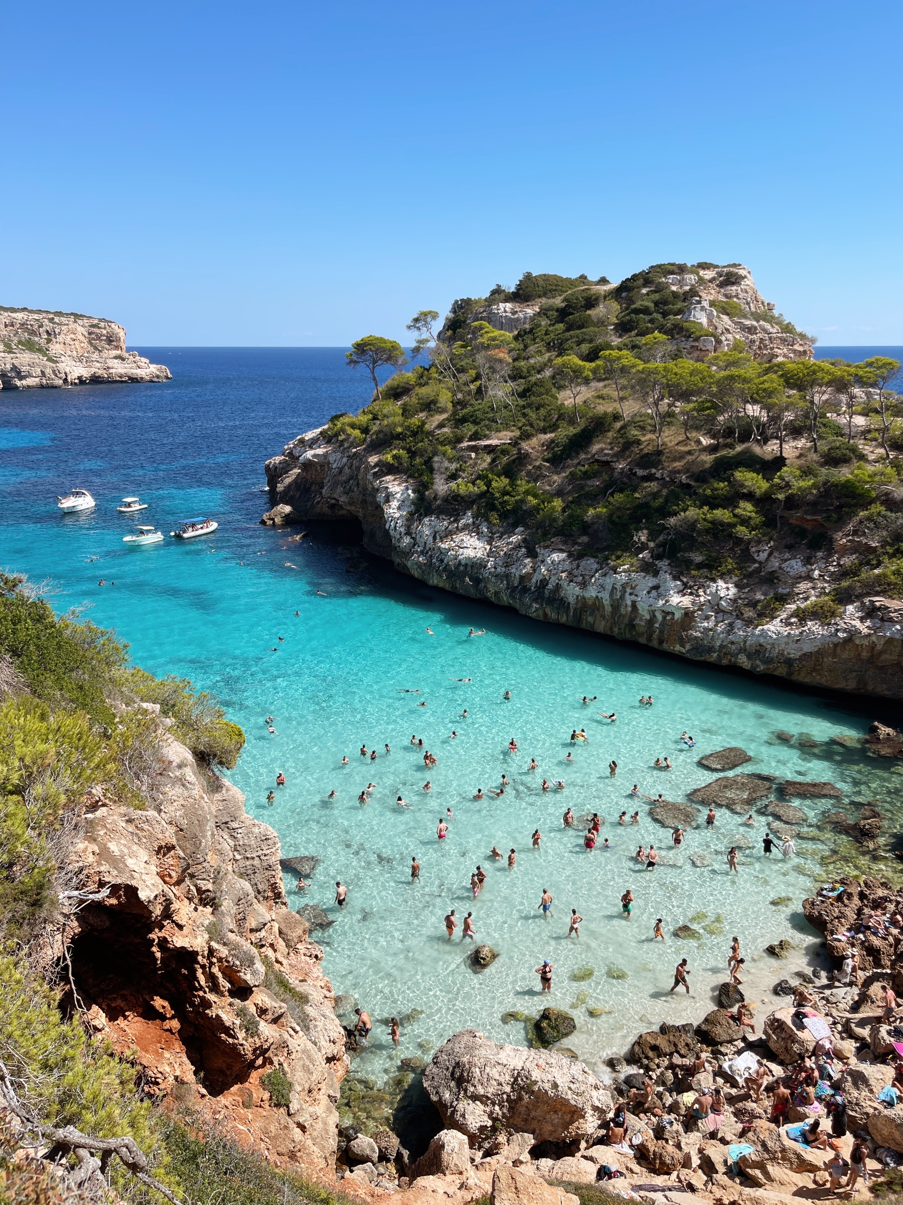 Beautiful sandy beach at Cala D'Or with crystal clear turquoise water