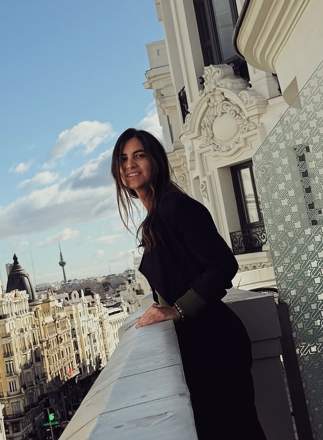 Natalia Moreno Arroyo on a balcony overlooking Madrid